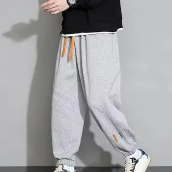 Vyriškos laisvalaikio sportinės kelnės Spalvingas sutraukiamas raištis Vyriškos jogger kelnės su elastinėmis juosmens kišenėmis Stilingas pavasaris/ruduo sportui